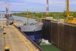 Stock photo of a large bulk carrier ship entering Lock 3 of the Welland Canals System at the St. Catharine's Museum, Welland Canals Centre, Great Lakes-St. Lawrence Seaway, St Catharine's, Ontario, Canada.