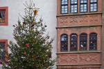 Stock photo of a Christmas tree and decorated windows of a building in the grounds of Burg Ronneburg (Burgmuseum), Ronneburg Castle, Ronneburg, Hessen, Germany, Europe.