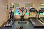 Stock photo of exercise equipment looking at the pool area at the Black Bear Resort & Spa, Port McNeill, Northern Vancouver Island, Vancouver.