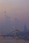 Stock photo of the foggy city of Frankfurt and the Main River at dusk, Hessen, Germany, Europe.