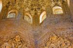 Stock photo of intricate carvings on the ceiling and archway in the Hall of the Abencerrajes (Sala de Abencerrajes), The Royal House (Casa Real), The Alhambra (La Alhambra) - designated a UNESCO World Heritage Site, City of Granada, Province of Granada, A