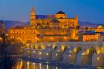 Stock photo of Puente Romano (bridge) spanning the Rio Guadalquivir (river) and the Mezquita (Cathedral-Mosque) during dusk in the City of Cordoba, UNESCO World Heritage Site, Province of Cordoba, Andalusia (Andalucia), Spain, Europe.