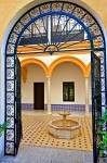 Stock photo of Entrance to a courtyard in the Reales Alcazares (Royal Palace) - a UNESCO World Heritage Site, Santa Cruz District, City of Sevilla (Seville), Province of Sevilla, Andalusia (Andalucia), Spain, Europe.