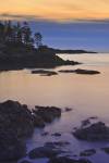 Stock photo of the Rocky shore of South Beach after sunset, Pacific Rim National Park, Long Beach Unit, West Coast, Pacific Ocean, Vancouver Island, British Columbia, Canada.