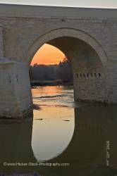 Puente Romano spans Rio Guadalquivir at sunset in city of Cordoba Province of Cordoba Andalusia