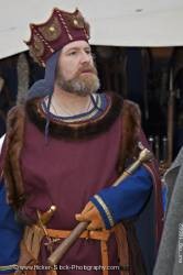 King dressed medieval clothing