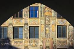 Murals painted on facade of building in Old Town district in City of Landshut Bavaria Germany