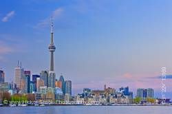 City of Toronto Skyline at Sunset as seen from Ontario Place Toronto Ontario Canada Blue Sky