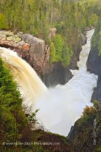 Stock photo of the rushing waters of Aquasabon Falls during a Spring flood, near the town of Terrace Bay, Ontario, Canada. 