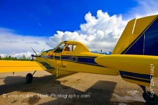 Stock photo of a bright yellow bush plane, an Air tractor AT-802, modified for bulk fuel hauling (capacity 4,000 litres) in Red Lake, Ontario, Canada. 