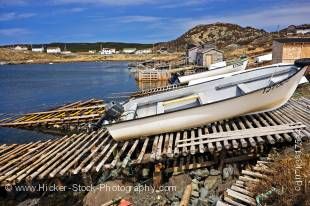 Stock photo of boats hauled out on wooden ramps in St Lunaire-Griquet Harbour, St Lunaire-Griquet, Viking Trail, Highway 436 enroute to L'Anse aux Meadows, Great Northern Peninsula, Northern Peninsula, Newfoundland, Canada.