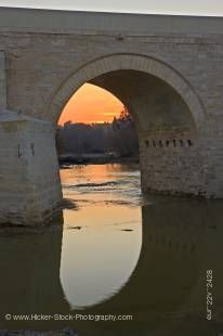 Stock photo of Puente Romano (bridge) spanning the Rio Guadalquivir (river) at sunset in the City of Cordoba, UNESCO World Heritage Site, Province of Cordoba, Andalusia (Andalucia), Spain, Europe.