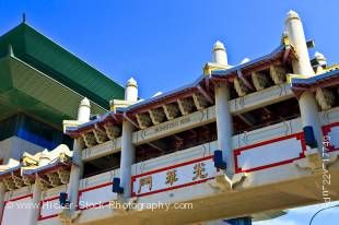 Stock photo of China Gate next to the Dynasty Building in downtown Chinatown, City of Winnipeg, Manitoba, Canada.