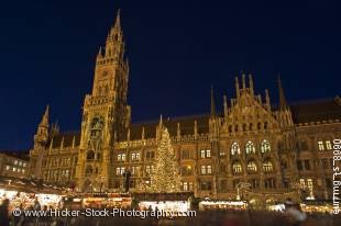 Stock photo of Christkindlmarkt (Christmas Markets) in the Marienplatz outside the Neues Rathaus (New City Hall) at dusk in the City of Mnchen (Munich), Bavaria, Germany, Europe.