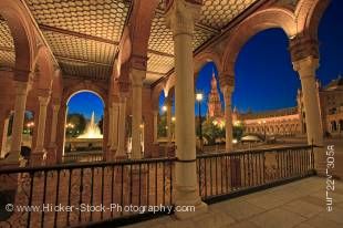 Stock photo of view of the fountain from the central building in Plaza de Espana, Parque Maria Luisa, at dusk in the City of Sevilla (Seville), Province of Sevilla, Andalusia (Andalucia), Spain, Europe.