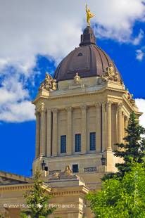 Stock photo shows the dark impressive dome with the golden boy statue sits atop the Legislative Building.
