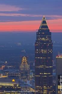 Stock photo of sunset over the Messeturm skyscraper and the City of Frankfurt am Main, Hessen, Germany, Europe.