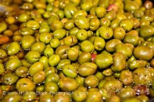 Stock photo of olives at a market stall in Plaza de la Corredera, City of Cordoba, UNESCO World Heritage Site, Province of Cordoba, Andalusia (Andalucia), Spain, Europe.