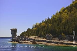 Stock photo of Sea Stack along the shoreline of Flowerpot Island in the Fathom Five National Marine Park, Lake Huron, Ontario, Canada.