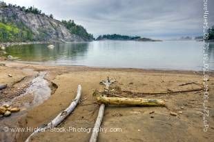 Stock photo of a section of sandy beach in Sinclair Cove, Lake Superior, Lake Superior Provincial Park, Ontario, Canada. 