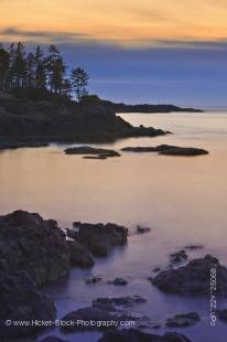 Stock photo of the Rocky shore of South Beach after sunset, Pacific Rim National Park, Long Beach Unit, West Coast, Pacific Ocean, Vancouver Island, British Columbia, Canada.