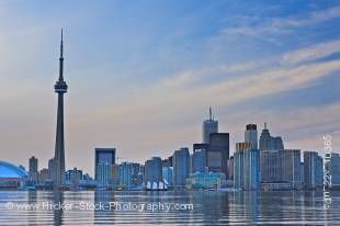 Stock photo of the Toronto City Skyline at dusk as seen across Lake Ontario from Centre Island in the Toronto Islands in Ontario, Canada.