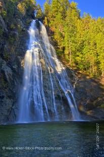 Stock photo of the Virgin Falls, which plunge 53 metres/174 feet in a fan formation down a rock escarpment along the Tofino Creek, a transition area of the Clayoquot Sound UNESCO Biosphere Reserve, Vancouver Island, British Columbia, Canada. 