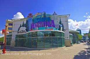 Stock photo of Visitor Centre with Explore Manitoba sign atop in The Forks, historic district.