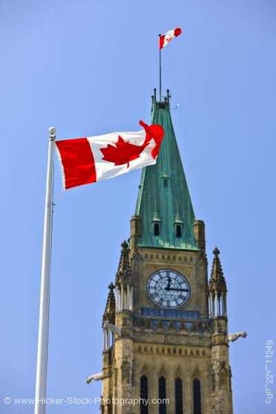 Stock photo of Canadian Flag and Peace Tower Parliament Ottawa