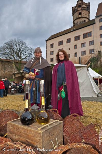 Stock photo of Couple dressed medieval clothing medieval market grounds Ronneburg Germany