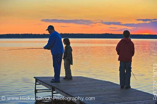 Stock photo of Father sons Lake Audy Riding Mountain National Park Manitoba Canada