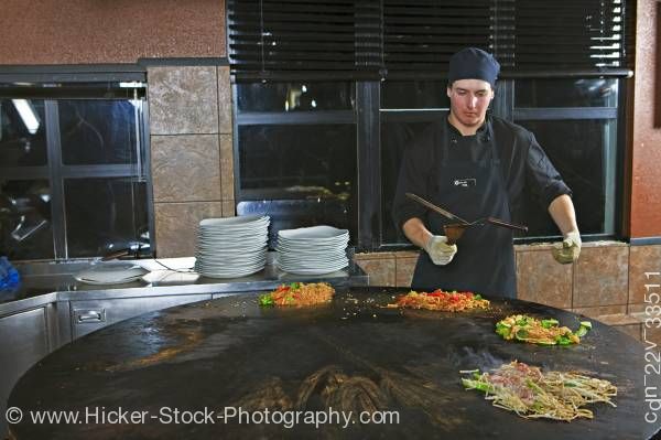 Stock photo of Chef Performance Mongolie Grill World Famous Restaurant Whistler Village British Columbia Canada