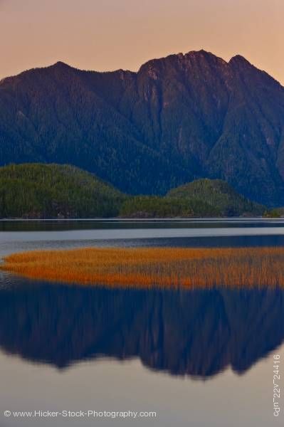 Stock photo of Mountain reflections Clayoquot Arm of Kennedy Lake Clayoquot Sound Vancouver Island British Columbia