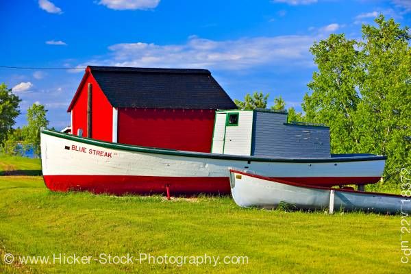 Stock photo of Old boats red shed Hecla Village Lake Winnipeg Hecla Island Manitoba Canada