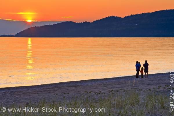 Stock photo of People on Beach Agawa Bay Sunset Lake Superior Provincial Park Ontario Canada