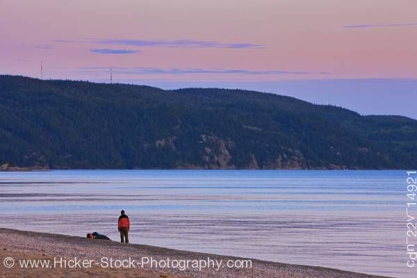 Stock photo of People and sunset over Agawa Bay Lake Superior Provincial Park Ontario