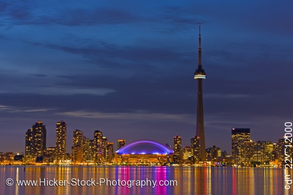 Stock photo of Skyline of Toronto with CN Tower and Rogers Centre at Dusk over Lake Ontario City of Toronto Ontario